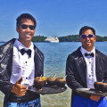 Waiters from Star Breeze in surf